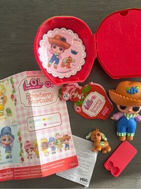 L.O.L. Surprise! Doll Playset with Red Case and Orange Hat